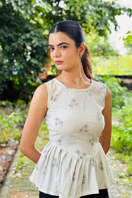 White Sleeveless Peplum Top with Subtle Floral Print – Casual & Office Wear - Folkiss