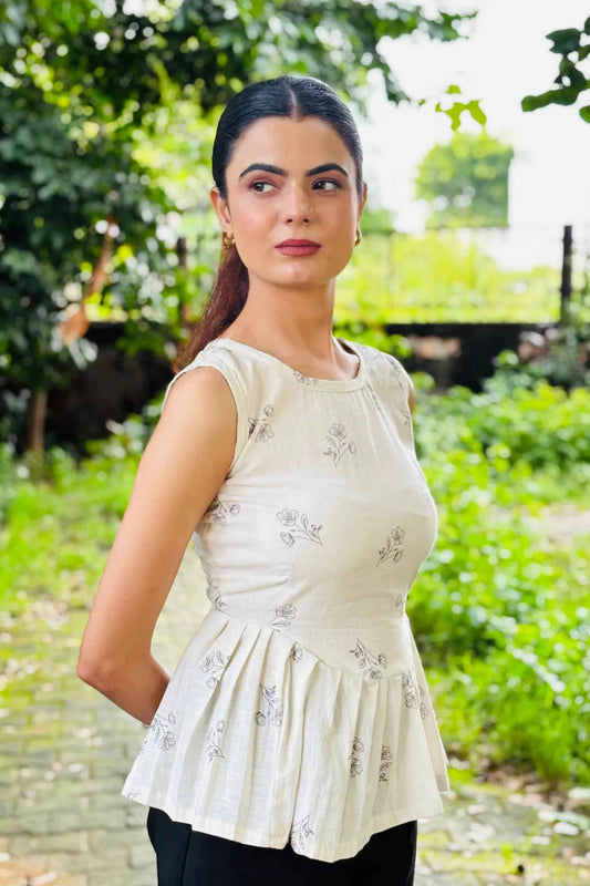 White Sleeveless Peplum Top with Subtle Floral Print – Casual & Office Wear - Folkiss